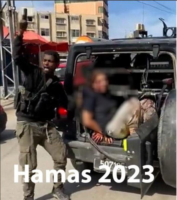Hamas shared a photo of a militant kidnapping a bloodied victim near the Gaza Strip. 