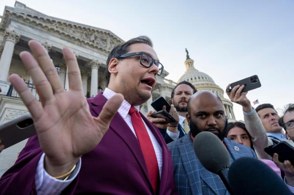 Rep. George Santos (R-NY) speaks to reporters outside the Capitol