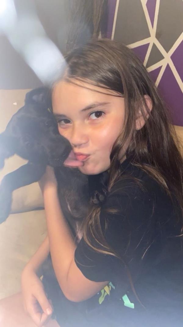 Katelynn Simond and her puppy