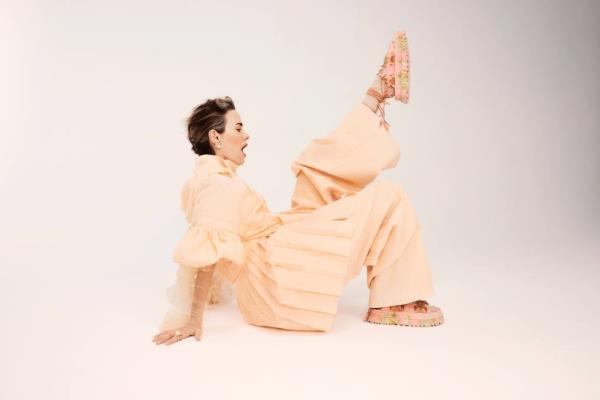 a woman wearing a black dress