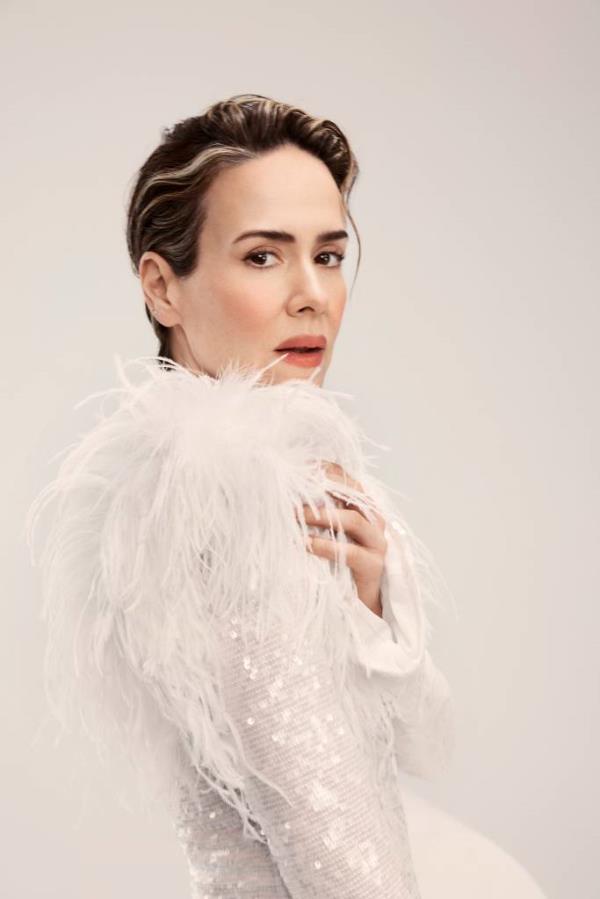 Sarah Paulson in a white dress.