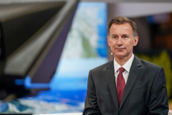 MANCHESTER, ENGLAND - OCTOBER 02: Jeremy Hunt, Chancellor of the Exchequer is interviewed by media on the second day of the the Co<em></em>nservative Party Co<em></em>nference on October 02, 2023 in Manchester, England. The Co<em></em>nservative Party Co<em></em>nference is being held in Manchester this year and will be Rishi Sunak's first speech to the party members as Co<em></em>nservative leader. (Photo by Ian Forsyth/Getty Images)