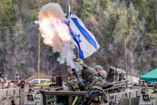 Israeli soldiers firing a mortar. 