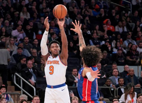 RJ Barrett, who scored xx points, shoots a jumper over Isaiah Livers during the Knicks' win. 