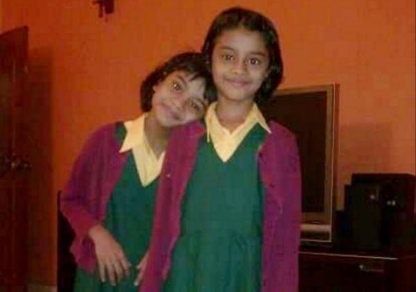 **Sent under embargo ? no use before 14.00BST October 1 2023** COLLECT - Suchita (left) & Savita (right) Naidu when younger. Photo released October 1 2023. See SWNS story SWMRtwins. Meet the identical twins who couldn't be more different - a girlie-girl Miss England beauty queen finalist and a self-co<em></em>nfessed tom-boy who became a trans man. Suchita and Savita Naidu, aged 21, grew up as biological sisters but have now been brother and sister for the past three years after Savita transitio<em></em>ned to a male. The pair were born five minutes apart in Camden, North London, before moving to Malaysia in 2005 when they were three-years-old. Despite being identical on the outside, that is wher<em></em>e the similarities ended and it was apparent the pair were different even from the age of two. Suchita loved make-up sets, Barbie dolls and anything pink while Savita refused to wear dresses and loved motorbikes, cars, football and superheroes. Suchita said she didn't even recognise her sister as a girl while they were growing up while Savita knew inside she was different from the age of five. The twins moved back to Britain, aged 10, with their parents and two elder sisters in 2012 to live in Watford and attended Watford Grammar School for Girls. Savita came out as gay in Year 9 in 2016 and as trans man in 2020 at the end of their A-Levels which brought them closer together than ever before. Three years later, Savita is now preparing to support sister Suchita after she reached the Miss England semi-finals.