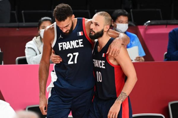 Evan Fournier (13) and Rudy Gobert (27) won a silver medal for France at the 2021 Olympics, but were eliminated in group play of the 2023 FIBA World Cup.