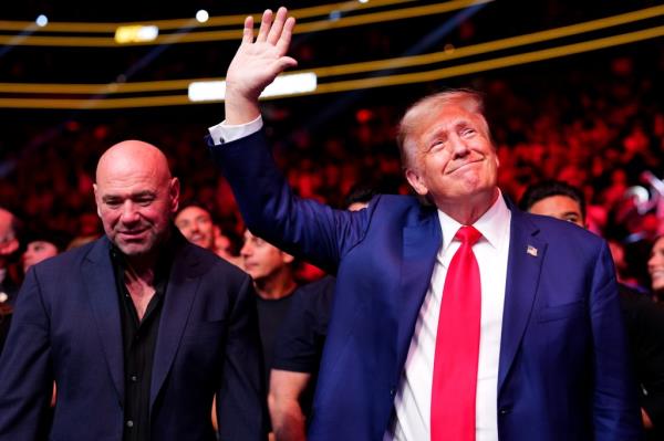 Dana White walks with Do<em></em>nald Trump into UFC 296.