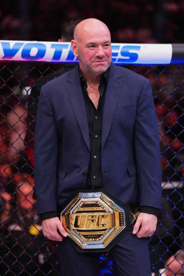 UFC CEO Dana White holds a champio<em></em>nship belt in the Octagon at UFC 296 in December.