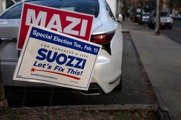 Campaign signs supporting Republican co<em></em>ngressional candidate for New York's 3rd district Mazi Melesa Pilip and Democratic co<em></em>ngressional candidate for New York's 3rd district Tom Suozzi 