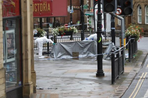 Police officers cordon off a street, in Halifax, West Yorkshire, wher<em></em>e multiple stabbings happened 