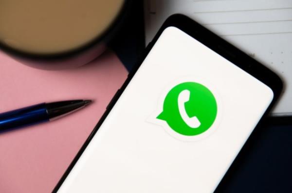 In this photo illustration a Whatsapp logo displayed on a