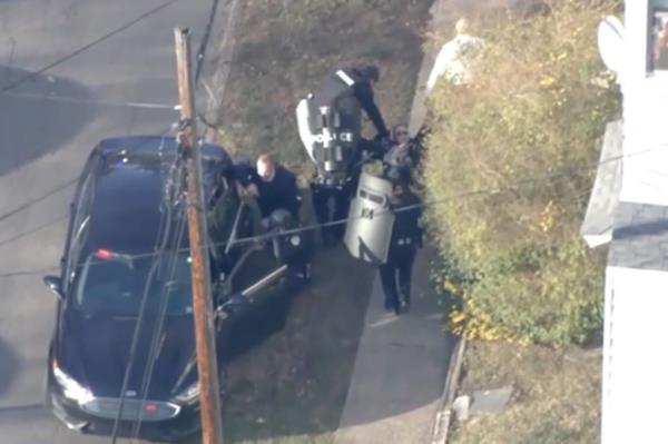 Police officers outside the home 