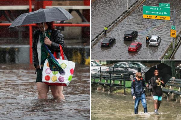 Children walking through a flooded walkway in Prospect Park South, Brooklyn on Sept. 29, 2023.