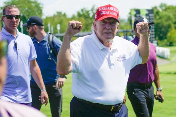 Former President Do<em></em>nald Trump greets supporters and sign autographs during the final round of the Bedminster Invitatio<em></em>nal LIV Golf tournament in Bedminster, N.J., Sunday, Aug. 13, 2023.