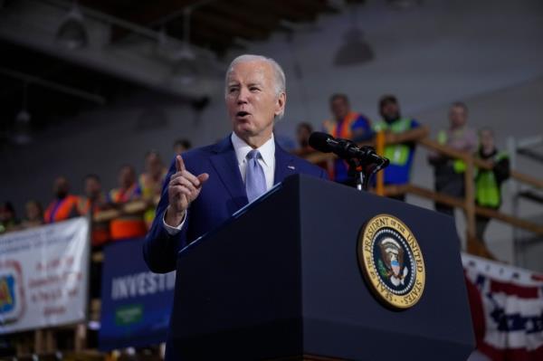 President Joe Biden speaks a<em></em>bout investment in rail projects, including high-speed electric trains, Friday, Dec. 8, 2023, in Las Vegas. 