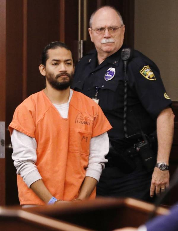 Mario Fernandez Saldana is led into a Duval County courtroom for his arraignment Tuesday, April 4, 2023.