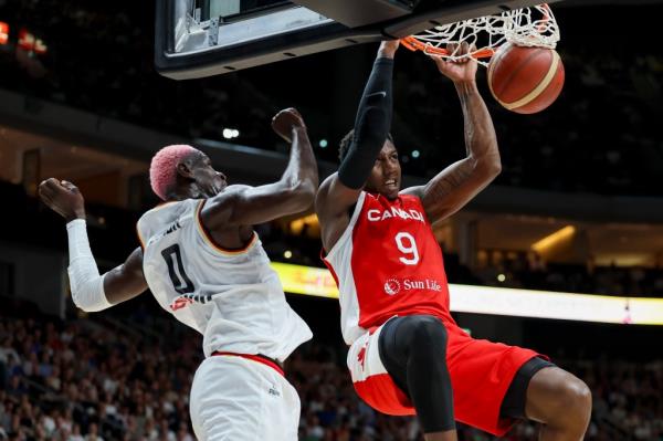 RJ Barrett dunks during Canada's win over Germany on Aug. 13.