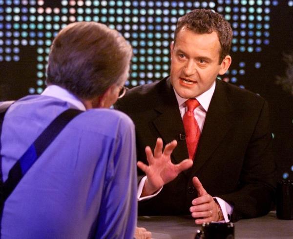 Paul Burrell (R) former royal butler, in his first live, primetime interview, discusses the co<em></em>ntroversy surrounding his legal battles with the royal family and his life as Princess Diana's butler with talk show host Larry King (L) on the CNN program 