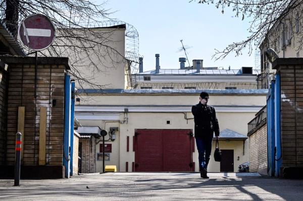 A man walks in front of the entrance to the Lefortovo prison
