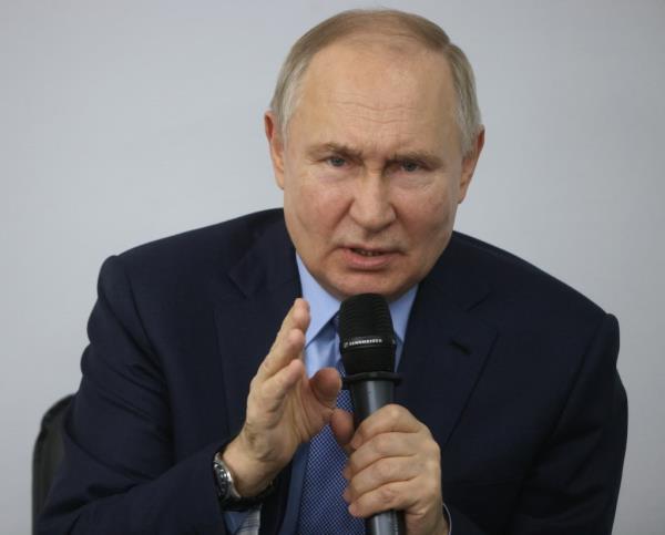 Russian President Vladimir Putin gestures as he speaks during his meeting with residents of Chukotka auto<em></em>nomous okrug, on Jan. 10, 2024 in Anadyr, Russia. 
