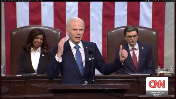 Mike Day as President Joe Biden. 