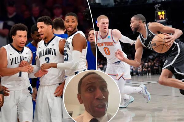 Mikal Bridges #1 of the Brooklyn Nets goes up for a shot as Jaylen Brown #7 of the Boston Celtics defends during the first half.  