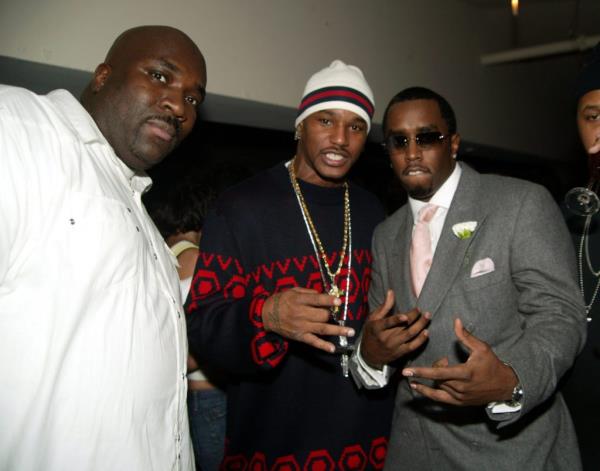 Big Joe, Cam'ron, and Sean 'P. Diddy' Combs posing for a photo at Zac Posen After Party during Olympus Fashion Week Fall 2005 in New York City