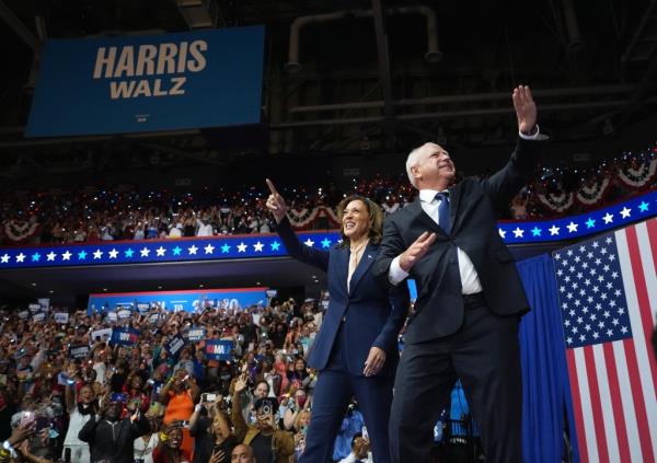 Harris and Democratic vice presidential candidate Minnesota Gov. Tim Walz appear on stage together during a campaign event at Girard College on August 6, 2024 in Philadelphia, Pennsylvania.