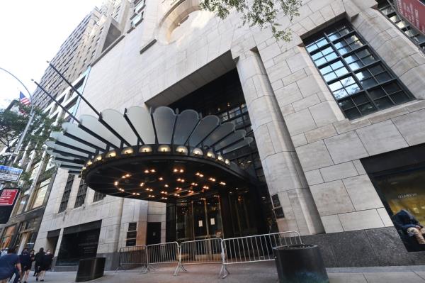 The shuttered Four Seasons Hotel in New York, closed since March 2020 due to the pandemic, featuring a round canopy over the entrance.