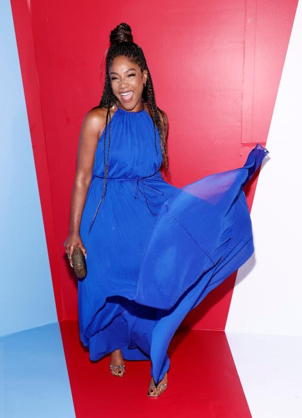 Tiffany Haddish in a blue dress at the alice + olivia Presentation by Stacey Bendet in September 2024 New York Fashion Week