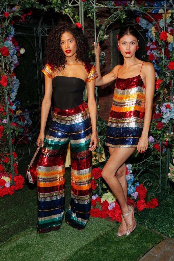 Models, including Ro<em></em>nni Hawk, posing at the alice + olivia by Stacey Bendet Spring 2025 Presentation in New York City