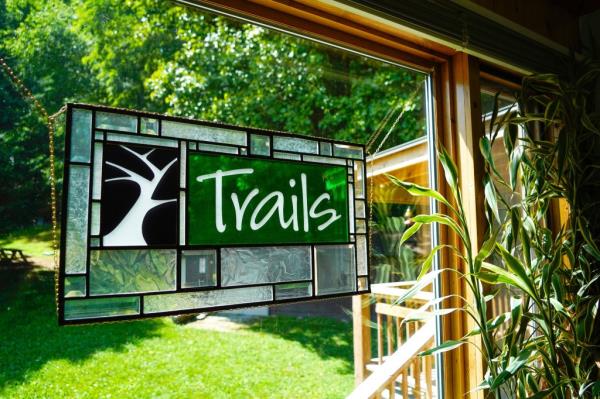 A sign for Trails Carolina Camp.