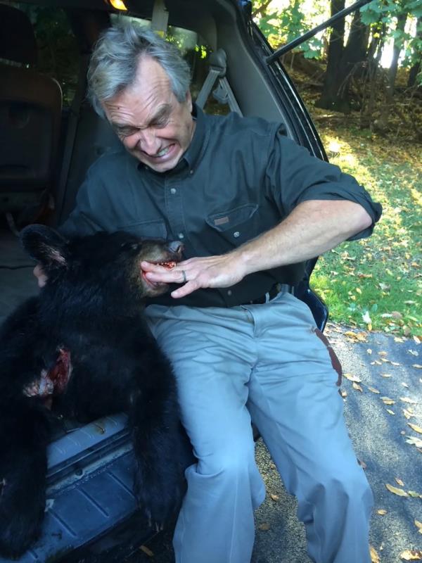 Robert F. Kennedy Jr. posed with the body of a dead bear cub in 2014.