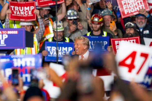 Do<em></em>nald Trump reacts as he arrives for a rally at 1st Summit Arena at the Cambria County War Memorial in Johnstown, Pennsylvania, on August 30, 2024. 