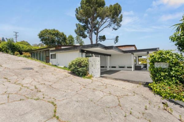 A Beverly Hills mid century modern home built by Brando's stuntman asks $2.9M