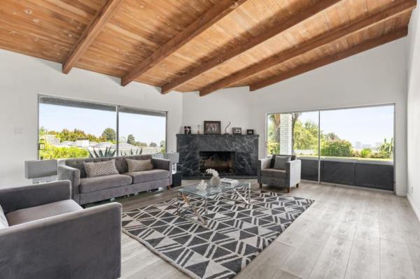 The great room with a fireplace -- and those views