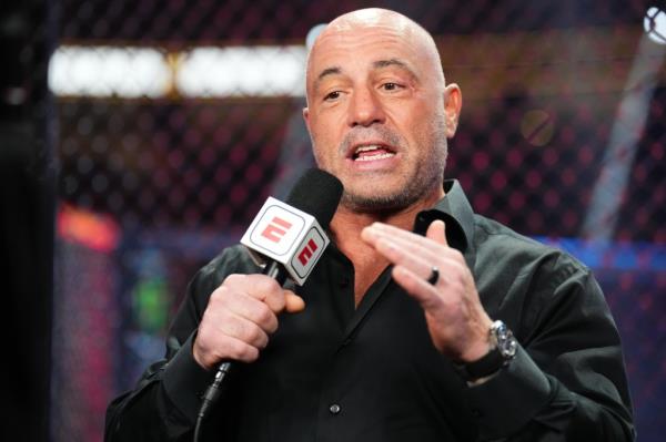 Joe Rogan announcing a fight at UFC 290 event in T-Mobile Arena, Las Vegas
