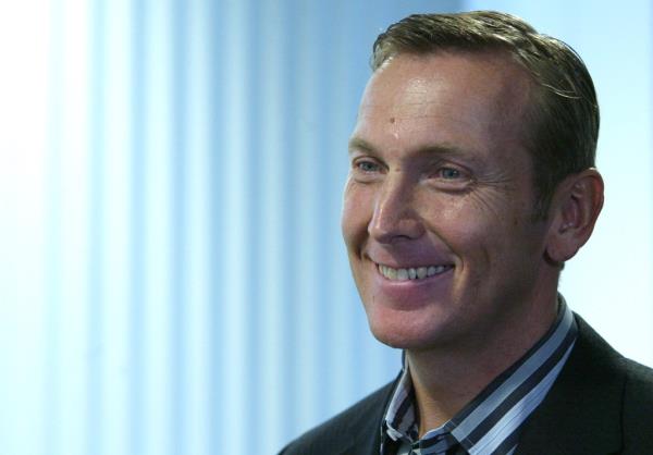 Jochen Zeitz, CEO of Puma AG, smiling at the annual news co<em></em>nference in Herzogenaurach, 2004