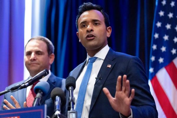 Carlos Trujillo, left, and Vivek Ramaswamy, speak during a news co<em></em>nference at Trump Tower on day four of Democratic Natio<em></em>nal Convention, Thursday, Aug. 22, 2024, in Chicago.