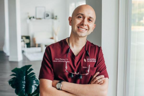 Dr. Dany Hanna from Hanna Gender Center in Frisco, TX, wearing a red shirt, specializing in gender surgeries