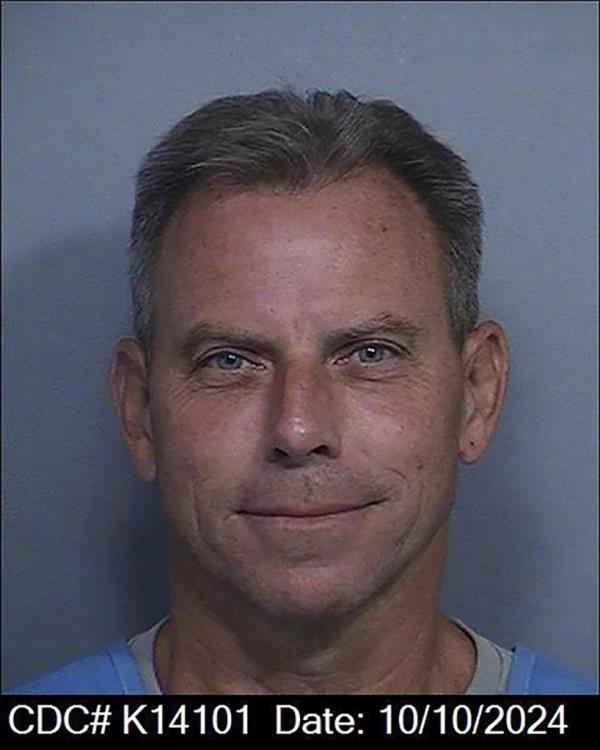 This photo provided by the California Department of Corrections, shows Erik Menendez. 