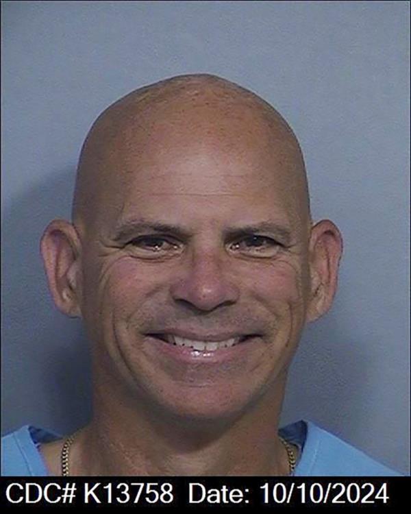 This photo provided by the California Department of Corrections, shows Lyle Menendez.