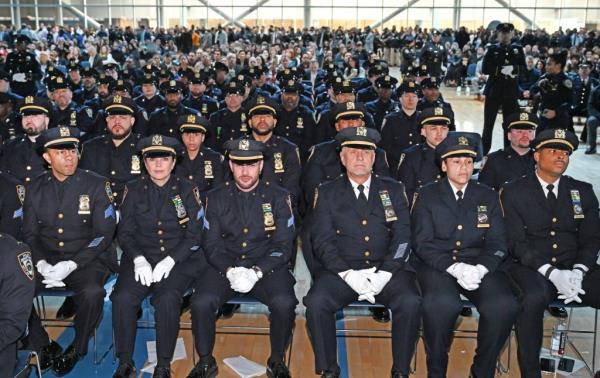 A photo of NYPD cops at a 2023 police promotion ceremony at the department Police Academy