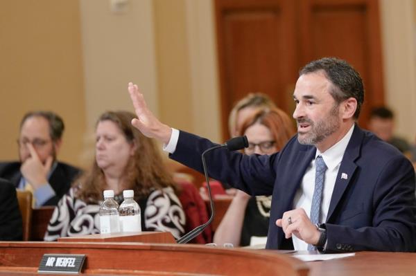 IRS Commissio<em></em>ner Danny Werfel testifying at a House hearing, speaking into a microphone, Capitol Hill, Washington, February 15, 2024.