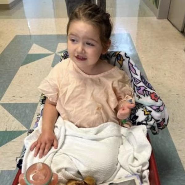 Crystal, 3, was left bloodied by the attack but was in high spirits after being taken to a hospital