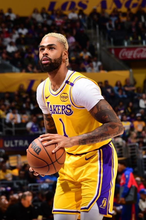 D'Angelo Russell #1 of the Los Angeles Lakers shoots a free throw during a game against the 76ers on November 8, 2024 at Crypto.Com Arena in Los Angeles, Ca.