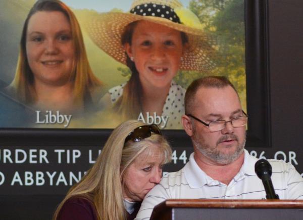 Grandparents of victim Libby German, Becky Patty, left, and her husband Mike Patty, speak during a news conference.