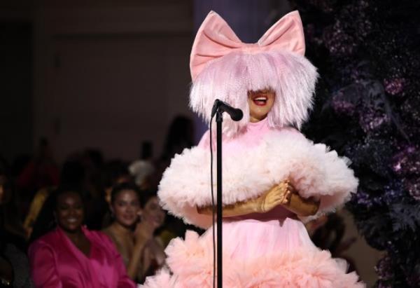 NEW YORK, NEW YORK - SEPTEMBER 08: Sia performs on the runway during the Christian Siriano SS24 Runway Show at The Pierre Hotel on September 08, 2023 in New York City. (Photo by Jamie McCarthy/Getty Images for Christian Siriano
