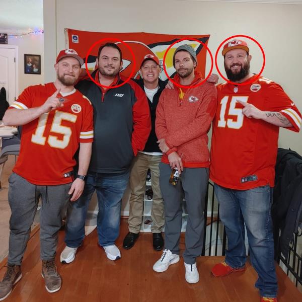 David Harrington (second left), Clayton McGeeney (second right) and Ricky Johnson (right) are shown with two unidentified fellow Chiefs fans