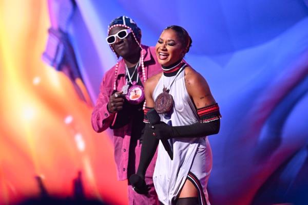 Flavor Flav and Jordan Chiles speak on stage during the 2024 MTV Video Music Awards at UBS Arena on September 11, 2024 in Elmont, New York. 